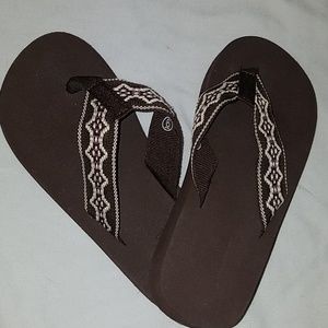 Brown and white sandals